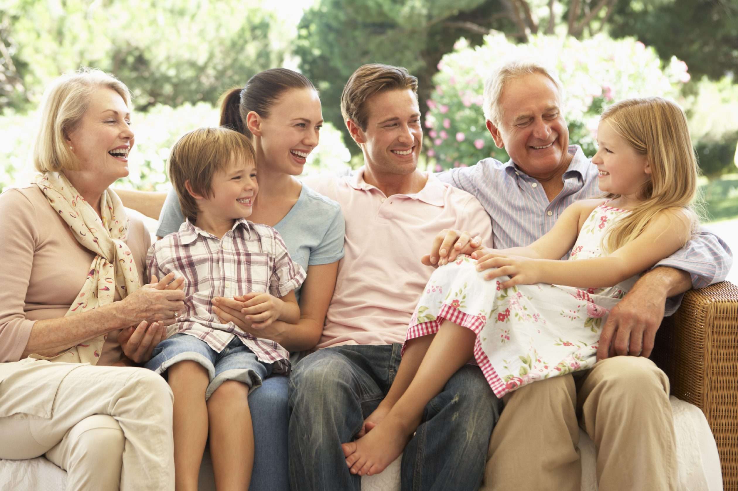 Family discussing car insurance options with a State Farm agent in Chicago